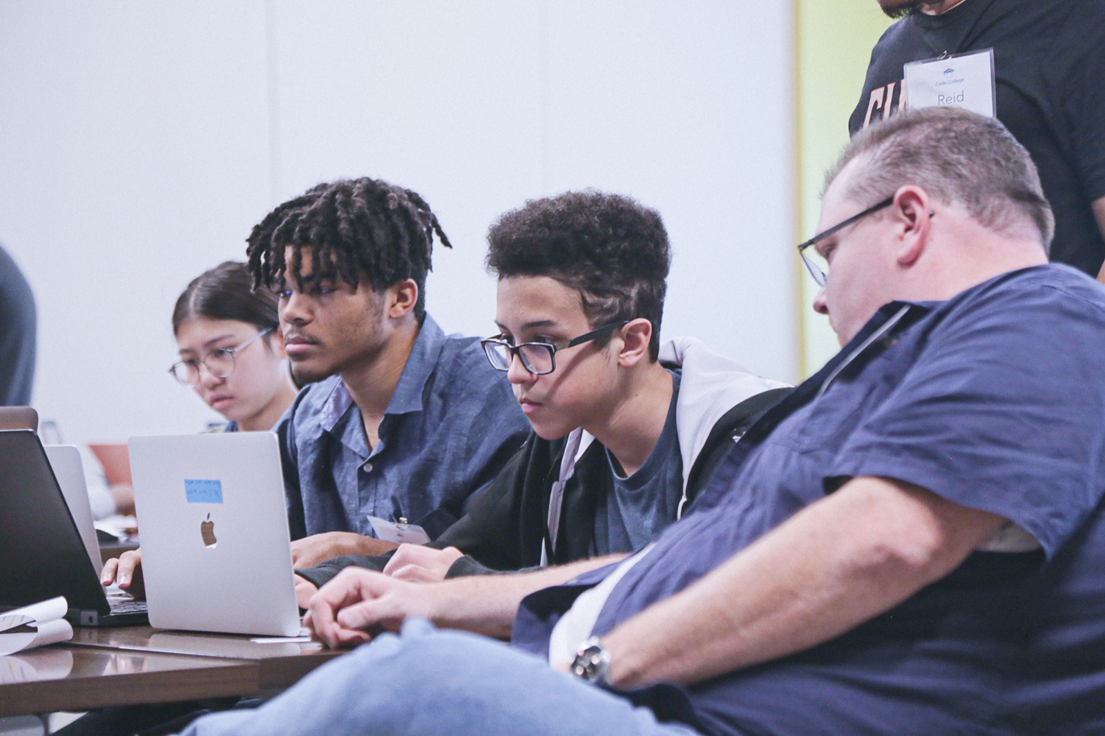 Code2College mentor working with a student